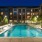 The courtyard and outdoor lounges at our 55 and over apartments in Plano, TX, featuring a luxury pool area.