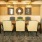 Meeting room at our senior living community in Plano, TX, featuring carpeted flooring and a conference table.